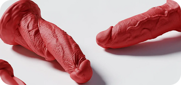 triple dragon dildo and thug dildo laid down