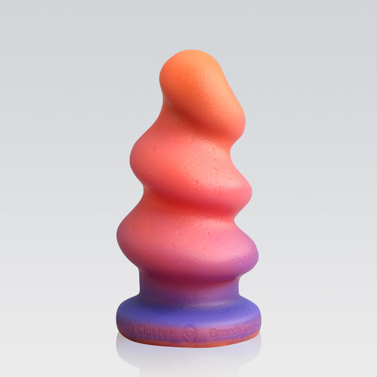 TORNADOSTOPPER-analplug-spiralbuttplug-beginnerbuttplug-orange-over-blue-color