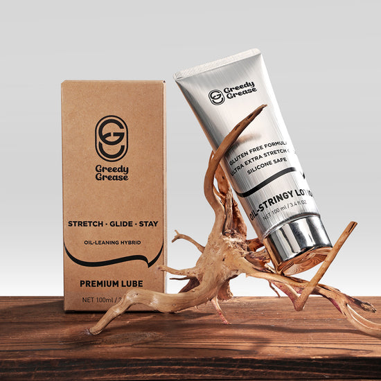 Greedy Grease - OIL STRINGY SILVER LOTION Anal Lube detail image showing nozzle, bottle body, and controlled lubricant application